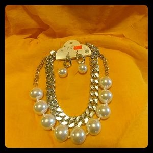 Necklace with matching earrings.